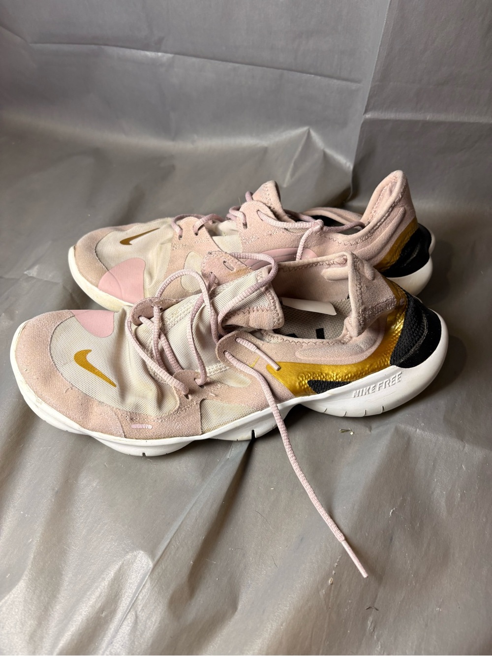 Nike Women’s Pink and Gold Athletic Training Shoes